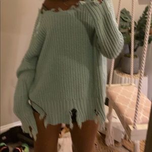 Trendy distressed sweater